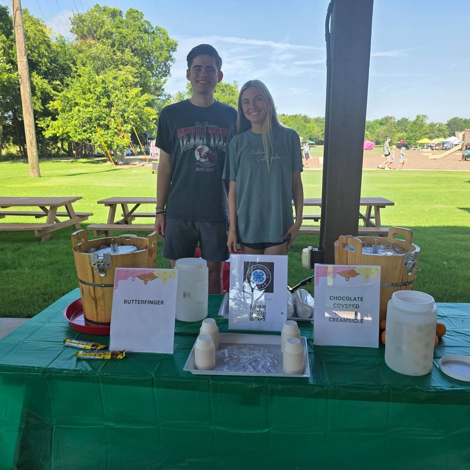 Artisan vendor sharing her handmade specialties